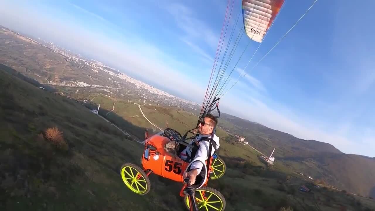 Paraglider takes 'flying car' for a spin | Play Stuff