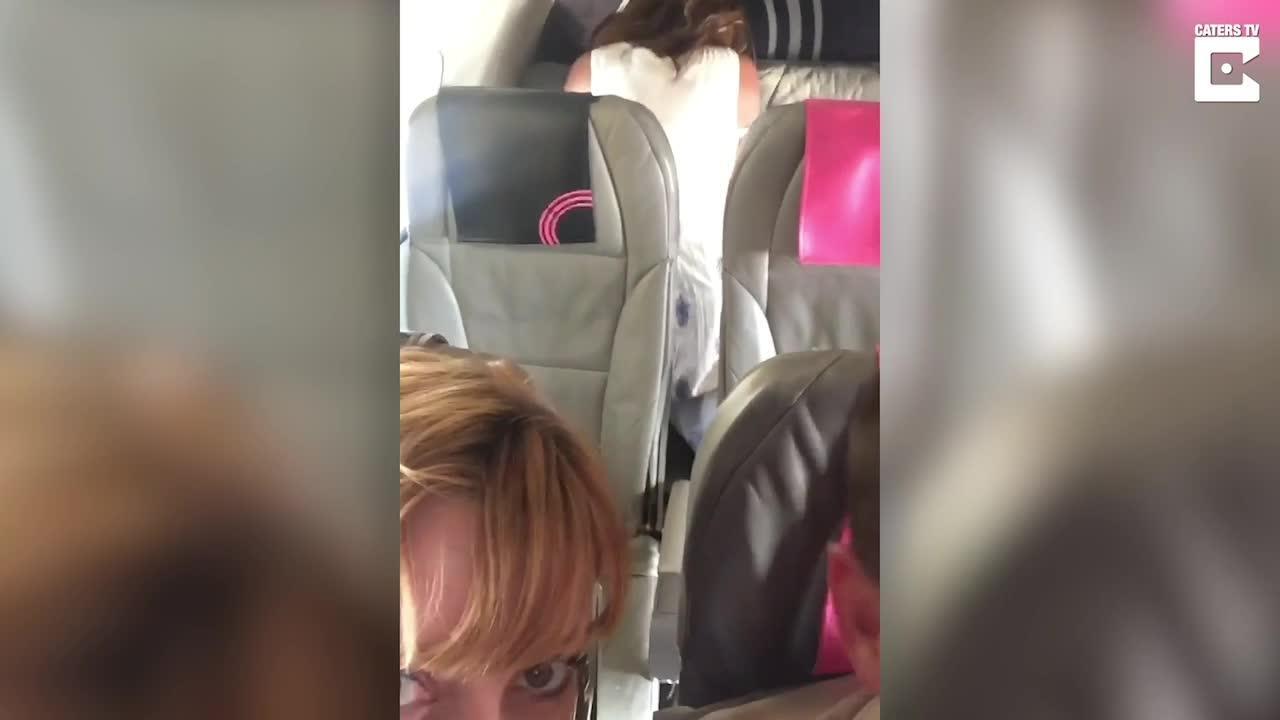 Mile High Club in the last row Shocked husband and wife share video of couple having sex on holiday