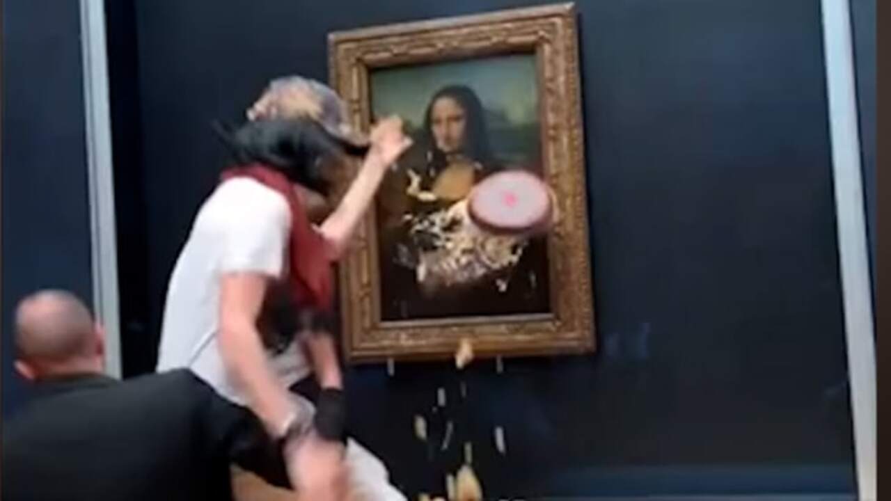 Man detained after throwing cake at Mona Lisa : NPR