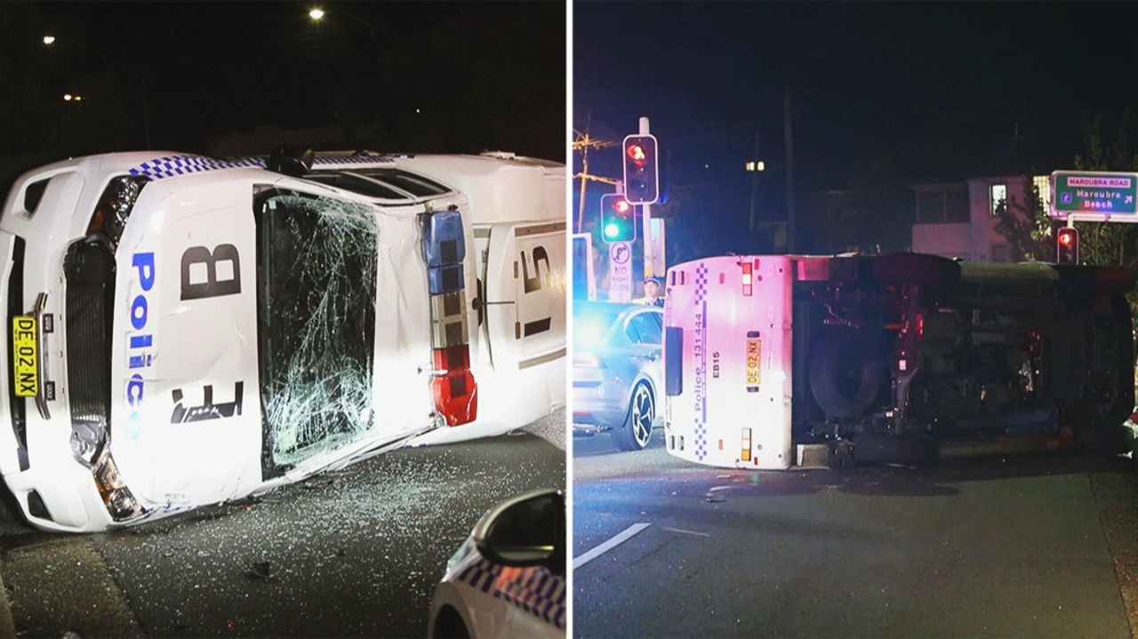 Two police officers escape serious injury after crash in Sydney