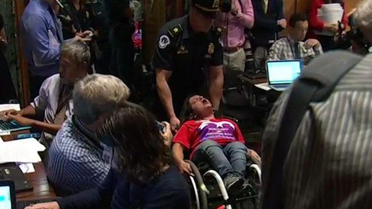 Protesters removed at hearing to repeal Obamacare