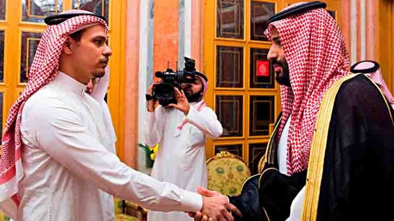 Khashoggi's son in forced photo op with Saudi royals