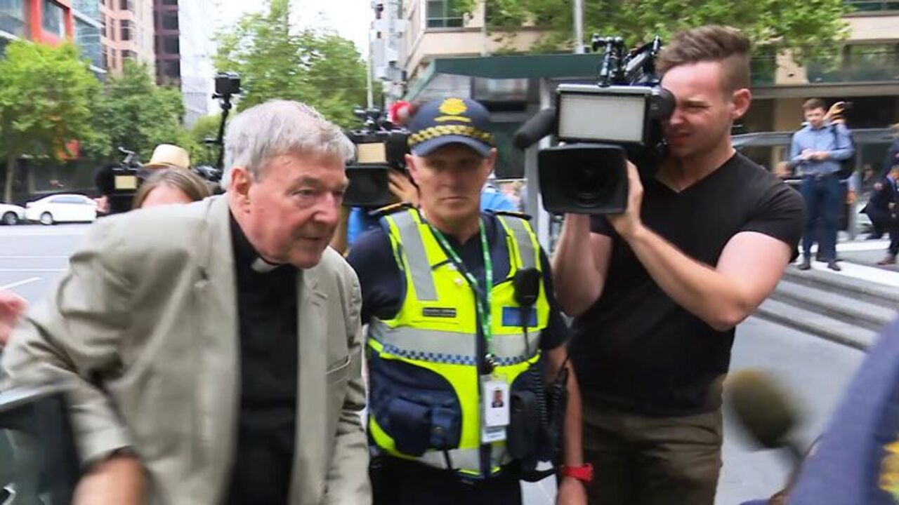 Cardinal George Pell arrives at court