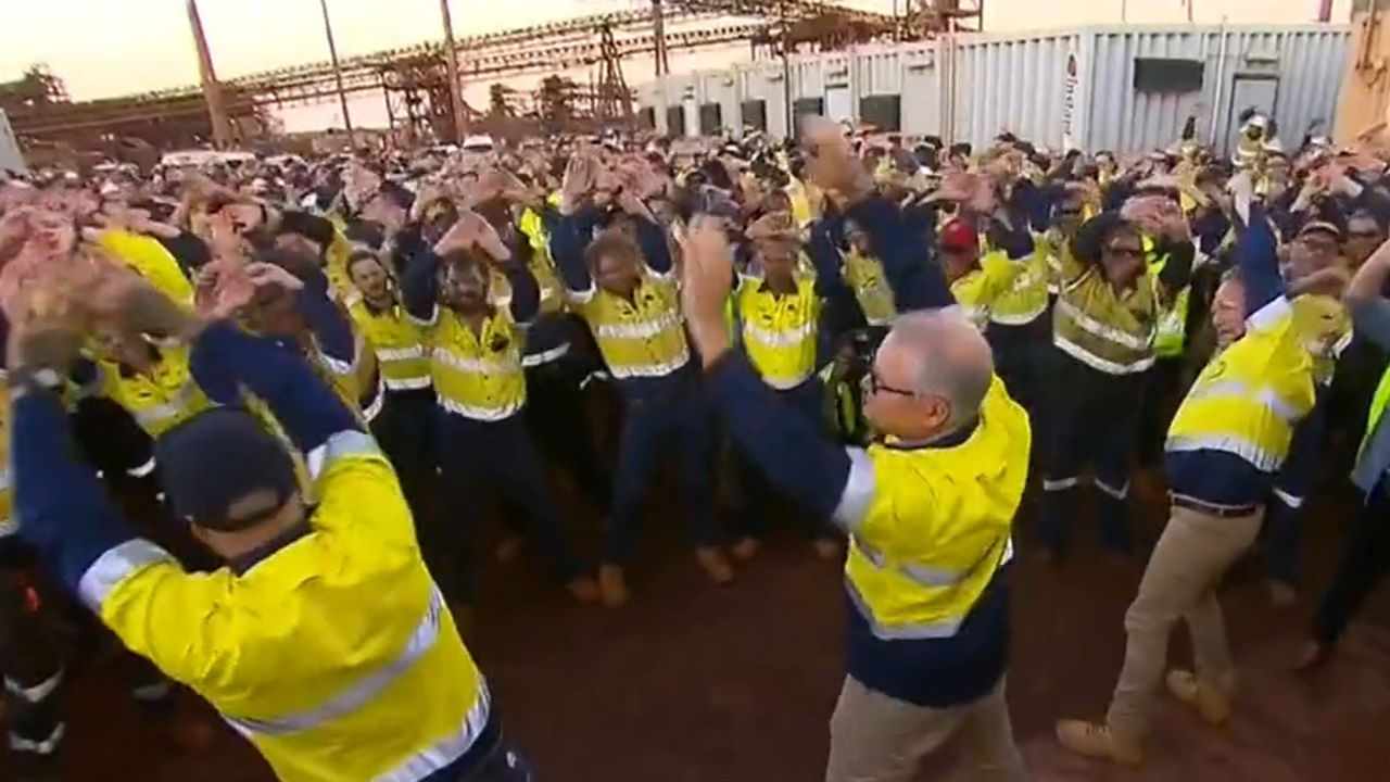 PM captured doing amusing warm-up exercises at WA mine