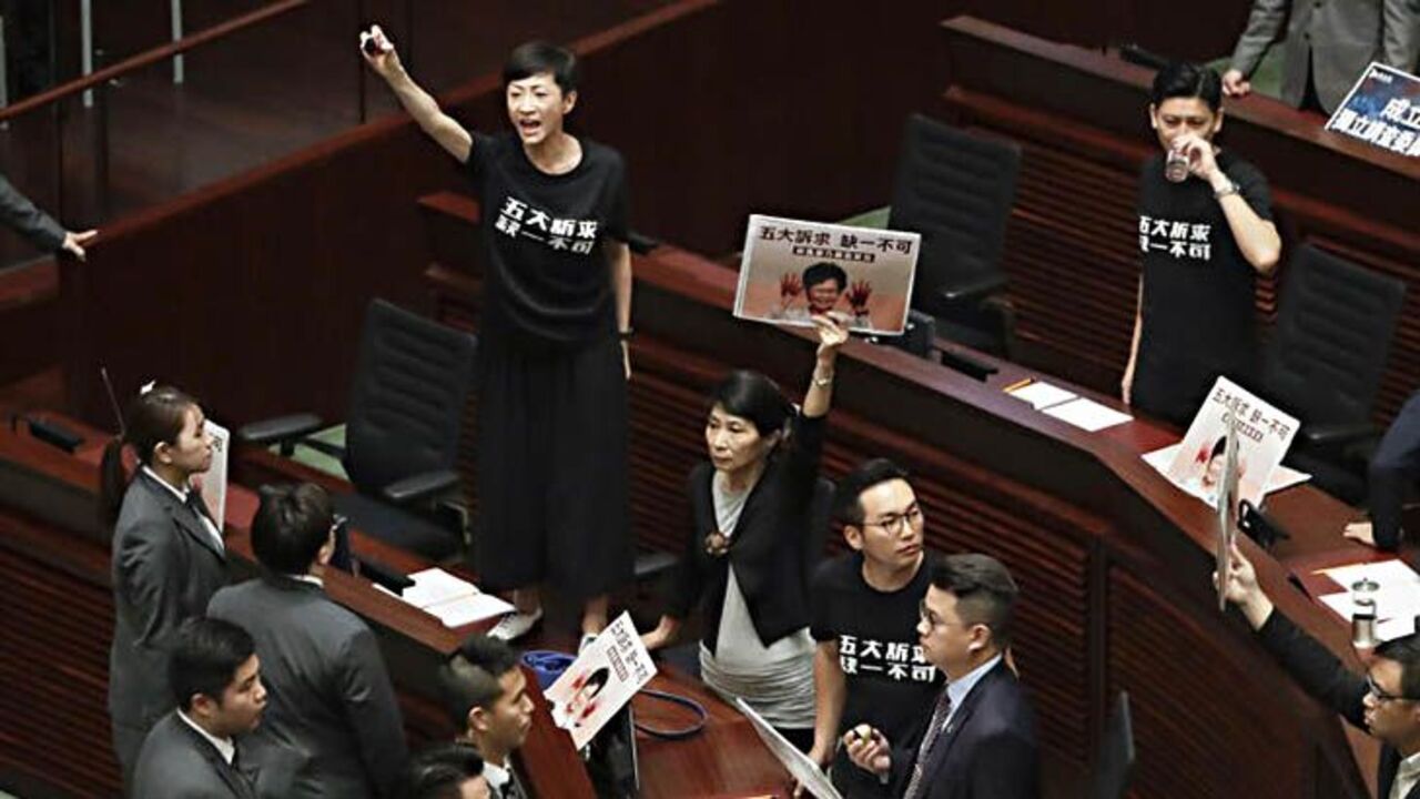 Carrie Lam heckled during policy address