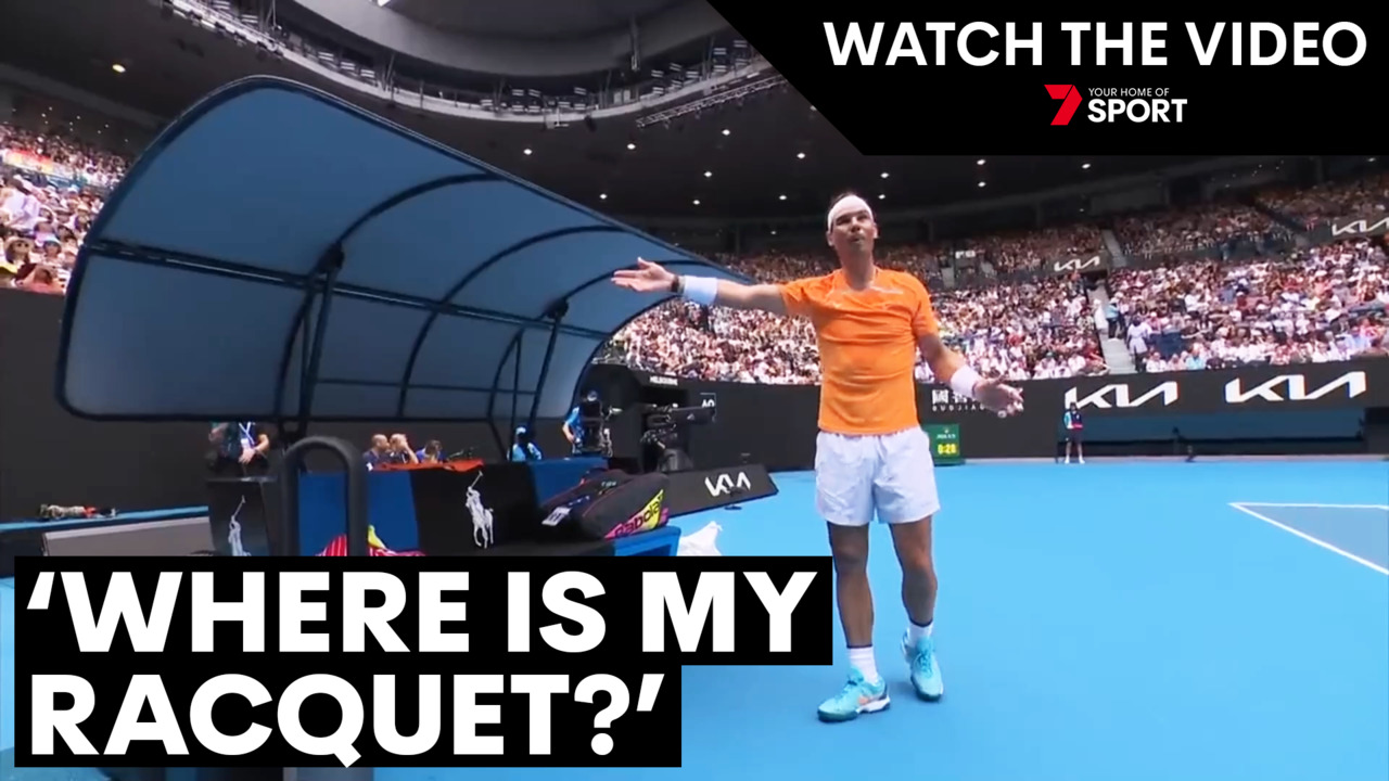 Watch as Rafael Nadal left perplexed when ballkid takes his racquet during Australian Open 2023 first-round match 7NEWS