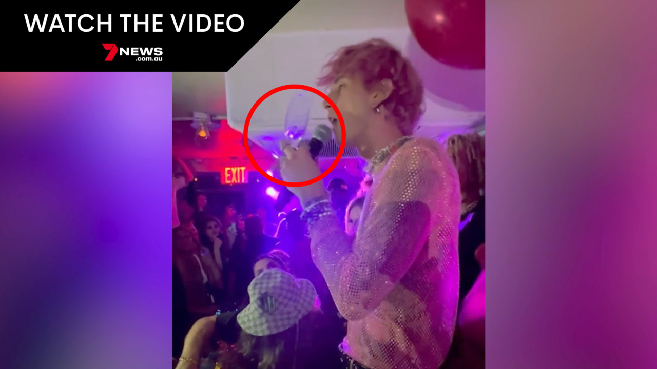 Machine Gun Kelly injures head with champagne glass