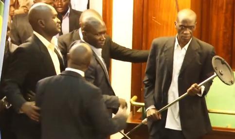 Uganda parliament brawl: chairs and mic stands used as politicians