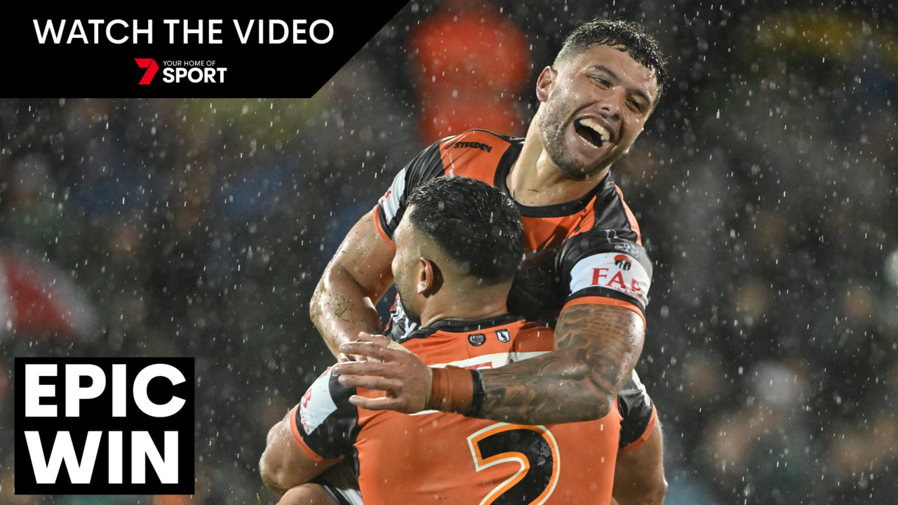 Watch Wild scenes as Wests Tigers toast drought-breaking victory over NRL premiers Penrith Panthers 7NEWS