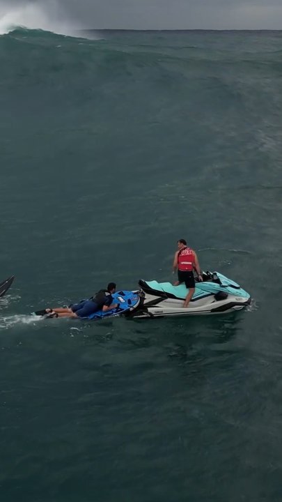 Swimmer rescued as massive waves slam Bondi Beach | news.com.au ...