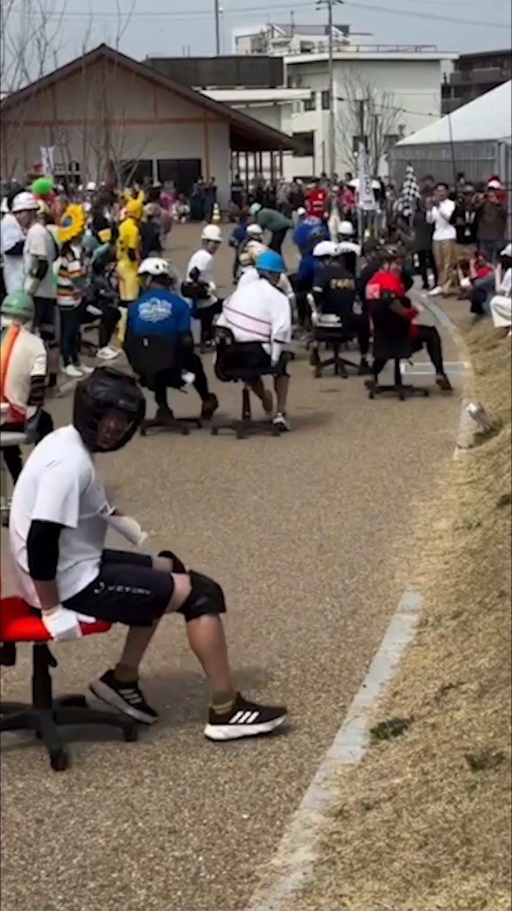 Japanese Chair Racing Backwards office chair racing a quirky tradition in Japan | Herald Sun