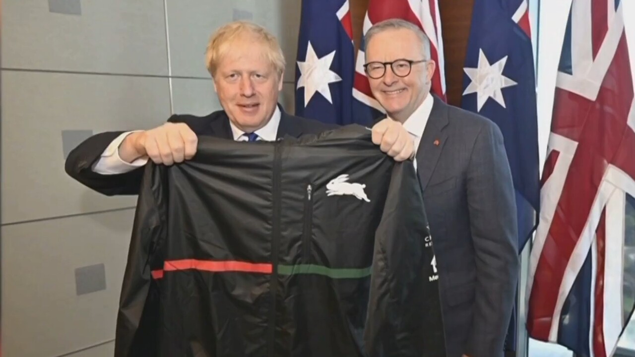 Anthony Albanese presents Boris Johnson with South Sydney