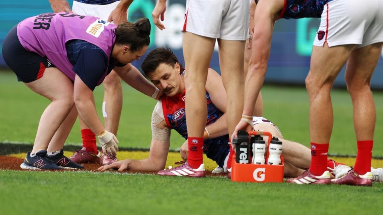 Knee surgery to sideline star Melbourne Demons defender Jake Lever for weeks