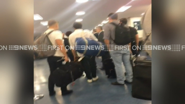 Budgie Nine' members caution other Aussie travellers after arriving home