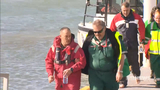 Sailors rescued after 12 hours stranded 