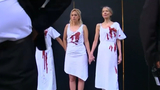 Climate change activists cover themselves in fake blood in London