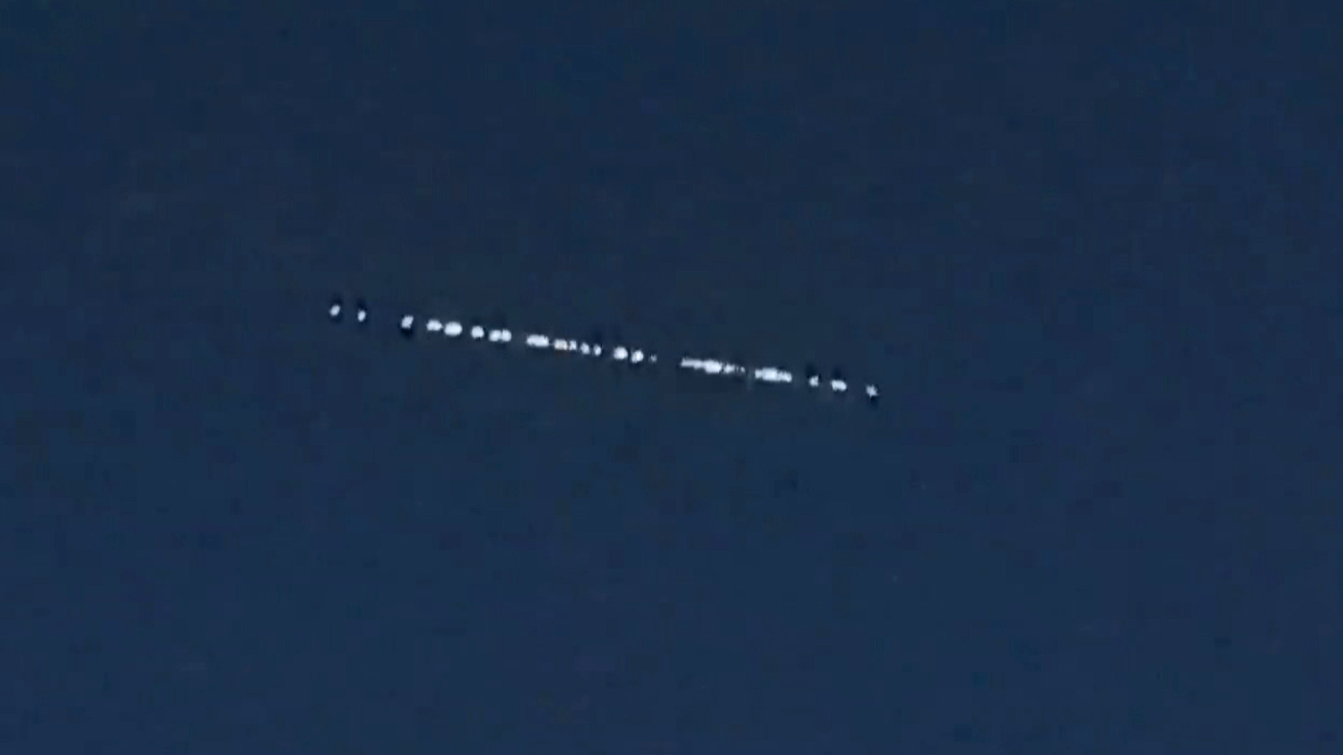 Trail of lights stretching across night sky catches Kiwi stargazers by surprise