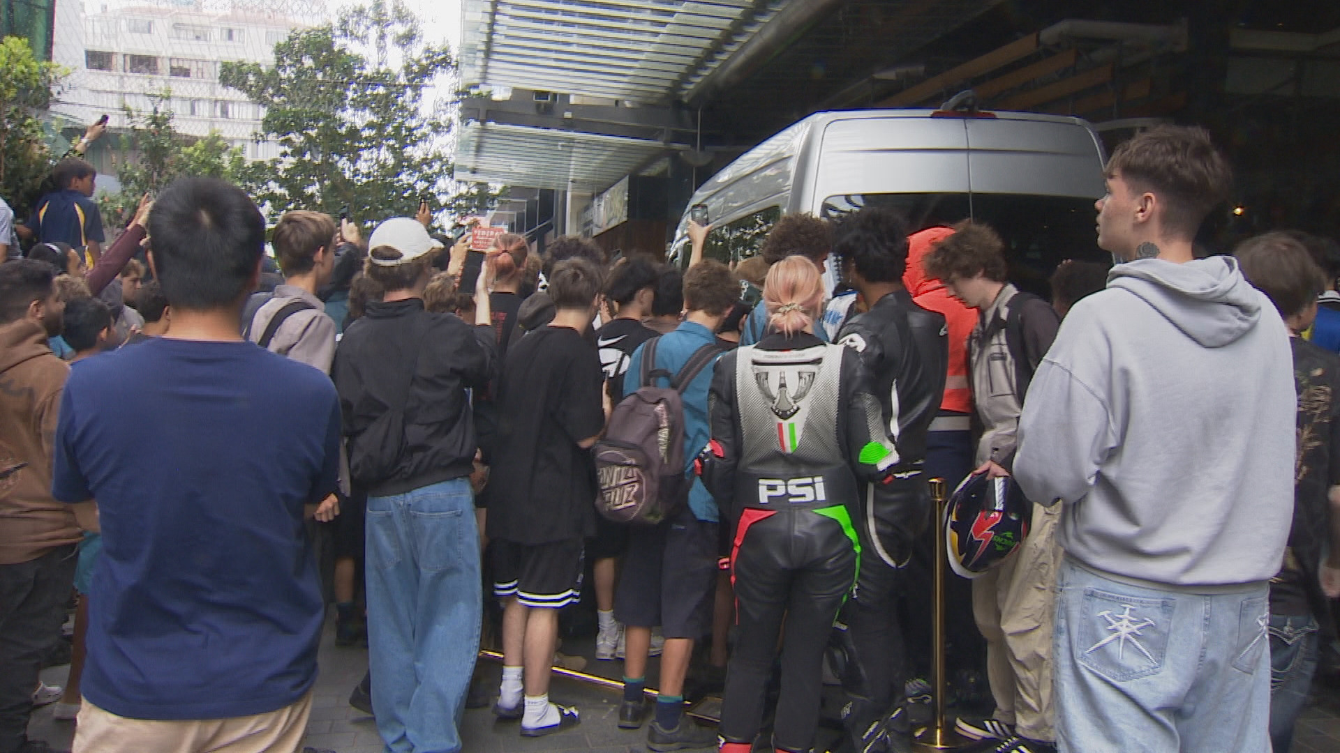 US streamer swarmed by fans at base of Sky Tower